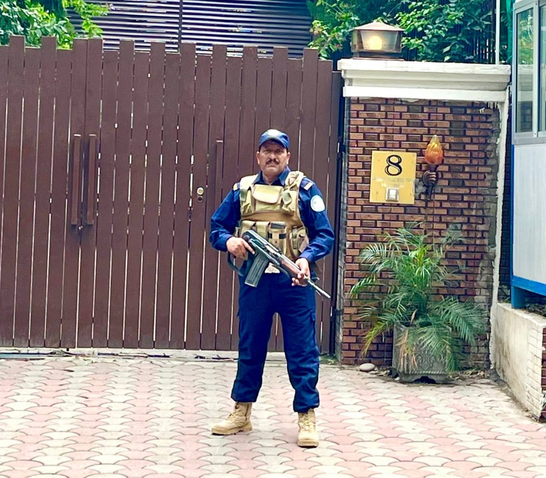 Security guard at the main gate of Baylis House